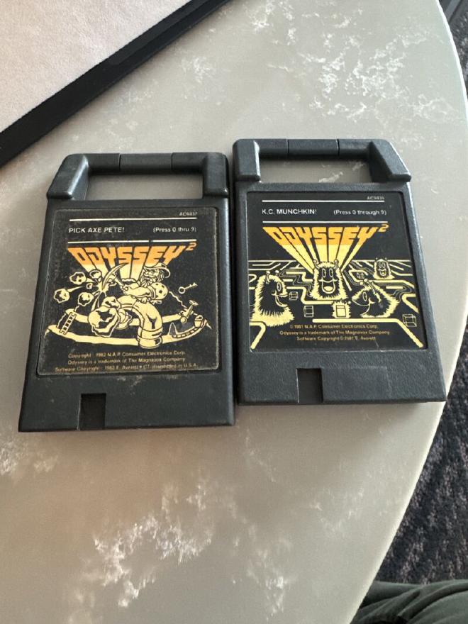Two Odyssey² cartridges: Pick Axe Pete! and K.C. Munchkin!